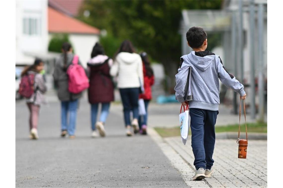 So viele Asylsuchende wie seit 2017 nicht mehr 2021 nahmen die Behörden rund 190.800 Asylanträge entgegen. Foto: Swen Pförtner/dpa