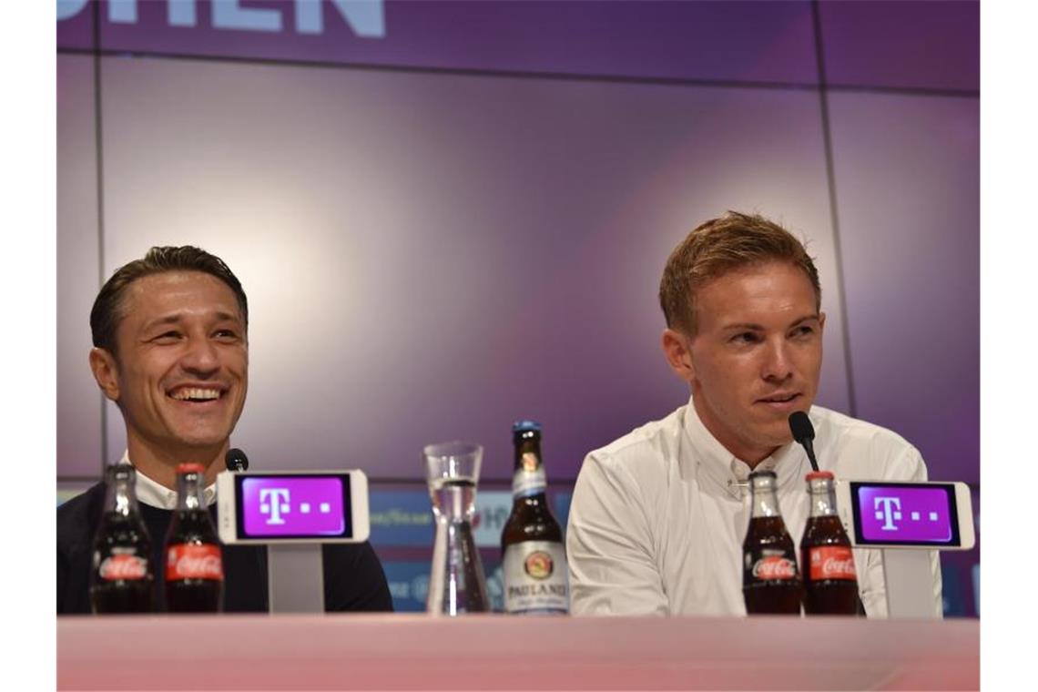 Am Samstag trifft Niko Kovac (l) mit dem FC Bayern auf Julian Nagelsmann und RB Leipzig. Foto: Lino Mirgeler
