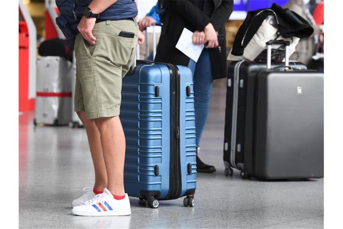 An Flughäfen gibt es seit kurzem kostenlose Corona-Tests für Urlaubs-Rückkehrer. Foto: Arne Dedert/dpa