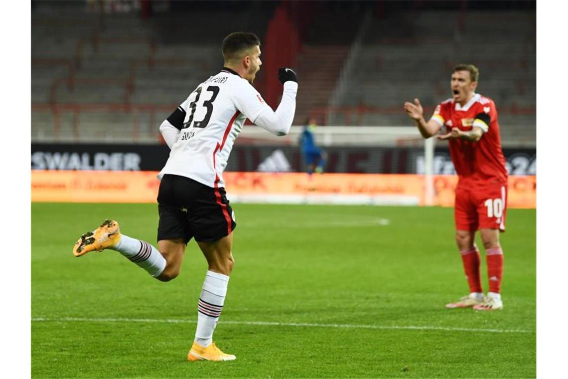 FC Bayern behauptet Bundesliga-Spitze - BVB patzt Andre Silva erzielte beim 3:3 bei Union zwei Frankfurter Treffer. Foto: Annegret Hilse/Reuters Images Europe/Pool/dpa