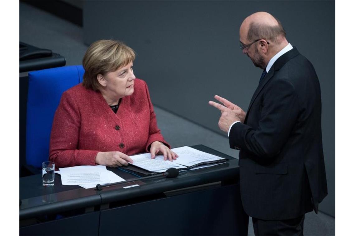 Angela Merkel und Martin Schulz Ende 2018. Beide werden den neuen Bundestag nicht mehr angehören. Foto: Bernd von Jutrczenka/dpa