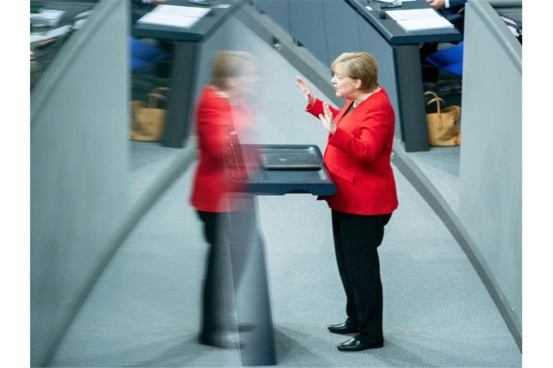Angela Merkel: „Wer, wenn nicht wir, soll denn zeigen, dass es geht, dass man dem Klimawandel etwas entgegensetzen kann.“. Foto: Kay Nietfeld/dpa