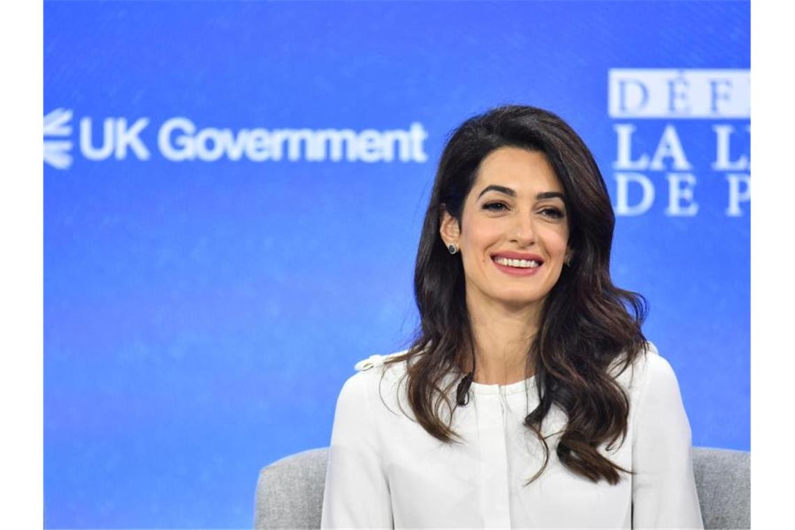 Anwältin Amal Clooney ist aus Protest gegen die Haltung der britischen Regierung von ihrem Amt als Sonderbeauftragte für Pressefreiheit zurückgetreten. Foto: Dominic Lipinski/PA Wire/dpa