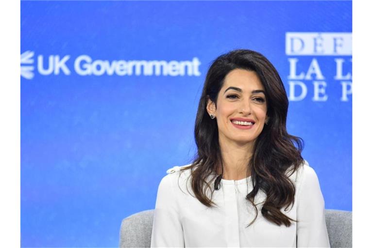 Anwältin Amal Clooney ist aus Protest gegen die Haltung der britischen Regierung von ihrem Amt als Sonderbeauftragte für Pressefreiheit zurückgetreten. Foto: Dominic Lipinski/PA Wire/dpa