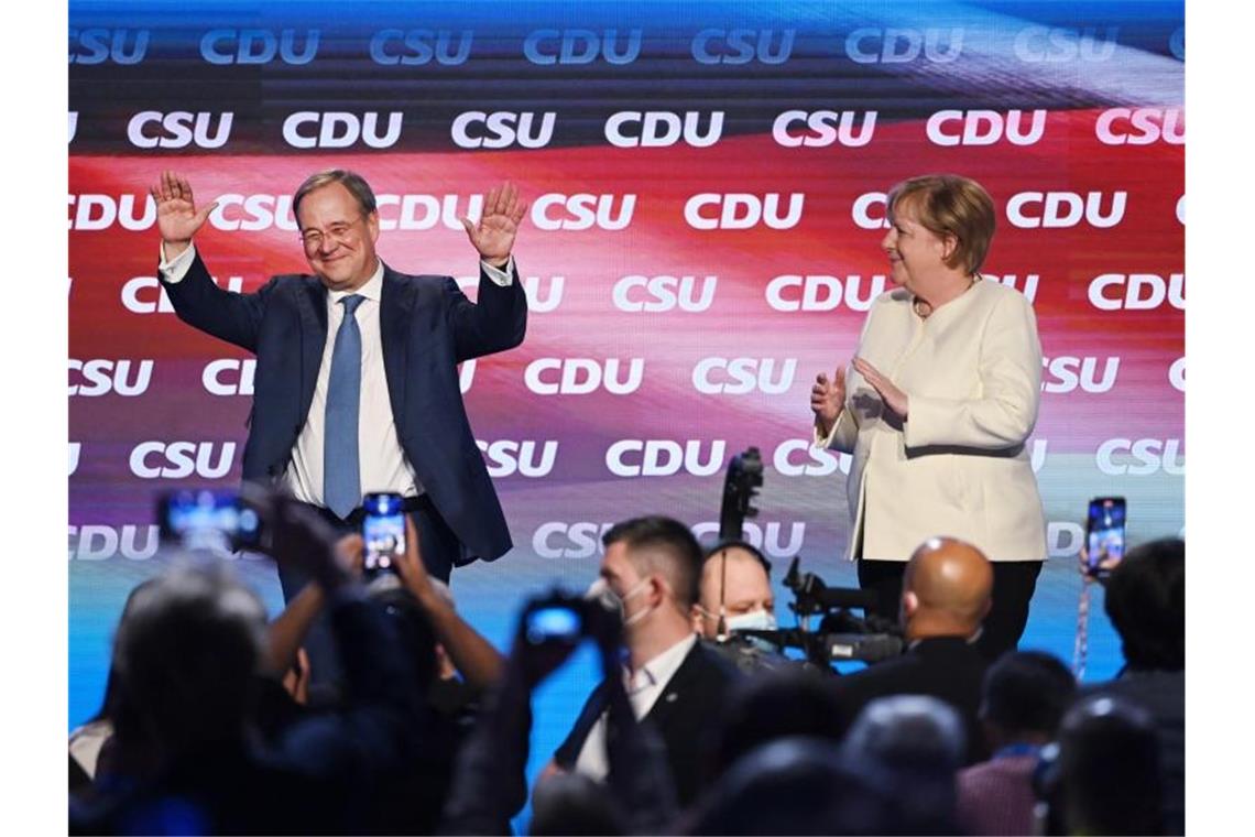 Schlussspurt vor der Wahl - Scholz will Koalition mit Grünen Armin Laschet und Angela Merkel treten heute in Laschets Heimatstadt Aachen auf. Foto: Sven Hoppe/dpa