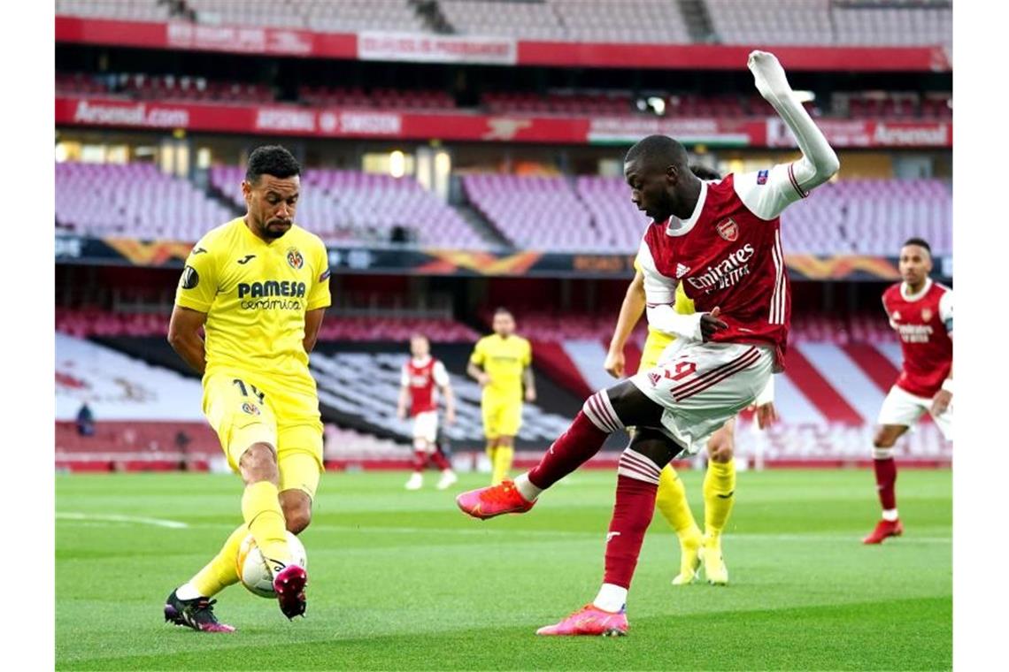 FC Villarreal und Manchester United im Finale Arsenals Nicolas Pepe (r) schießt auf das Tor. Foto: John Walton/PA Wire/dpa