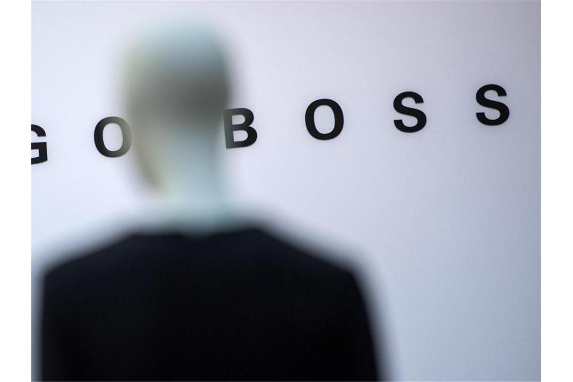 Hugo Boss schreibt wieder Gewinne Auch beim Personal sparte Hugo Boss: So wurden befristete Verträge nicht verlängert. Foto: Sebastian Gollnow/dpa