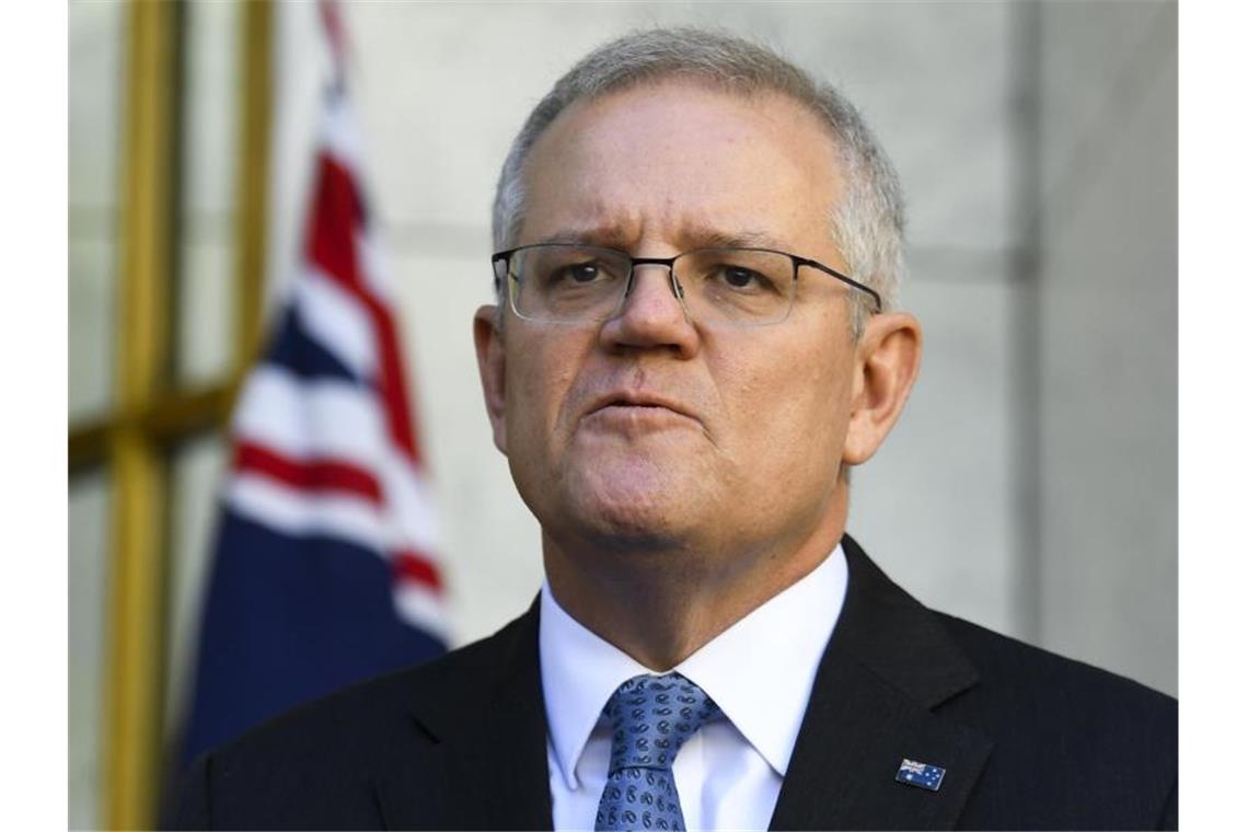 Australien lehnt ehrgeizigere Klimaziele ab Australiens Premier Scott Morrison während einer Pressekonferenz in Canberra. Foto: Lukas Coch/AAP/dpa