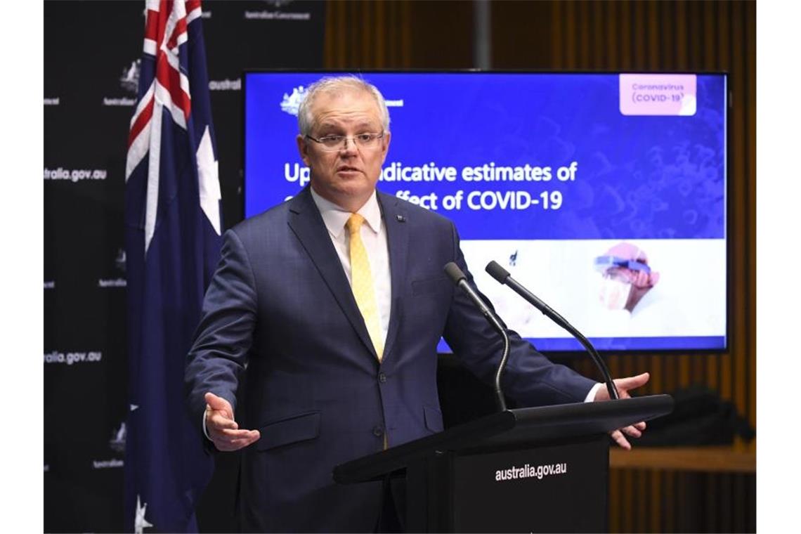 Australiens Premier Scott Morrison während einer Pressekonferenz zu den Auswirkungen der Krise. Foto: Lukas Coch/AAP/dpa