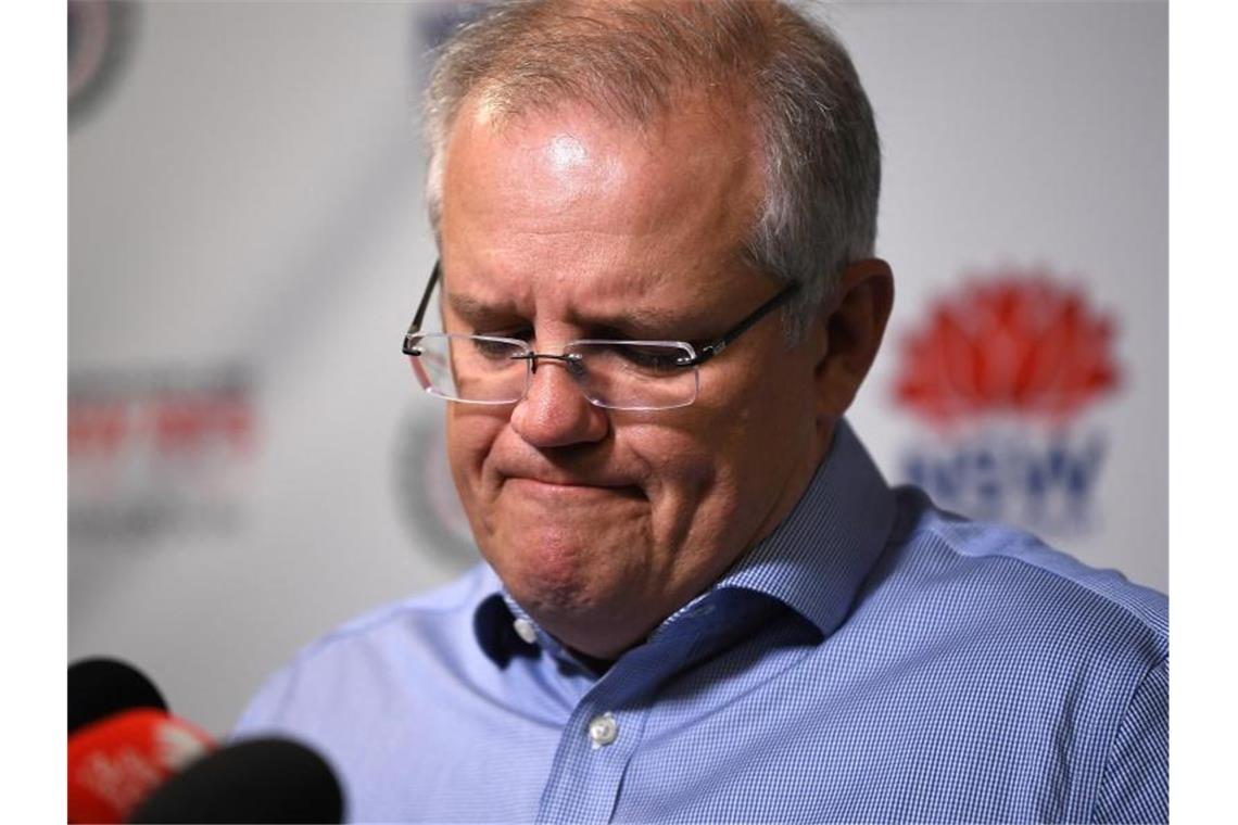 Australische Buschfeuer werden über Weihnachten wüten Australiens Premierminister Scott Morrison entschuldigte sich für seinen Hawaii-Urlaub. Foto: Joel Carrett/AAP/dpa