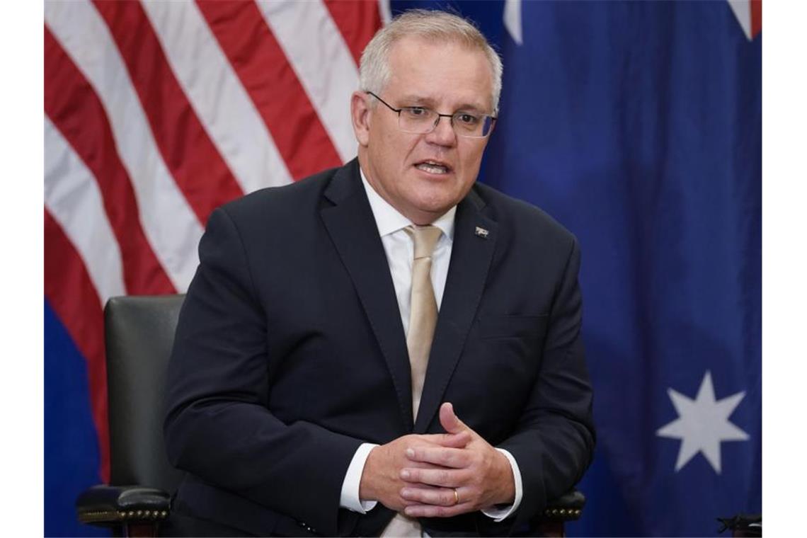 Klimagipfel: Nimmt Australiens Premier teil? Australiens Premierminister Scott Morrison ist noch unschlüssig, ob er zum UN-Klimagipfel fährt. Foto: Evan Vucci/AP/dpa/Archivbild