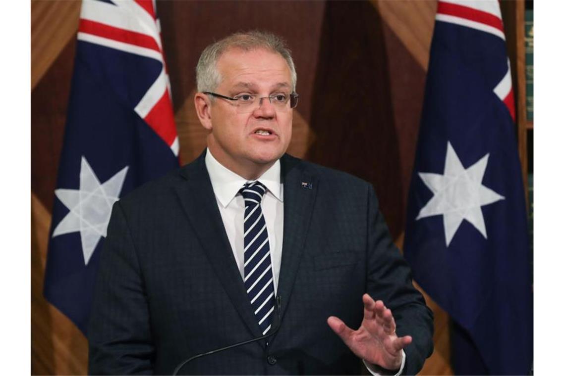 Zwei weitere Tote im Kampf gegen Australiens Buschbrände Australiens Regierungschef Scott Morrison während einer Pressekonferenz Mitte Dezember in Melbourne. Foto: David Crosling/AAP/dpa
