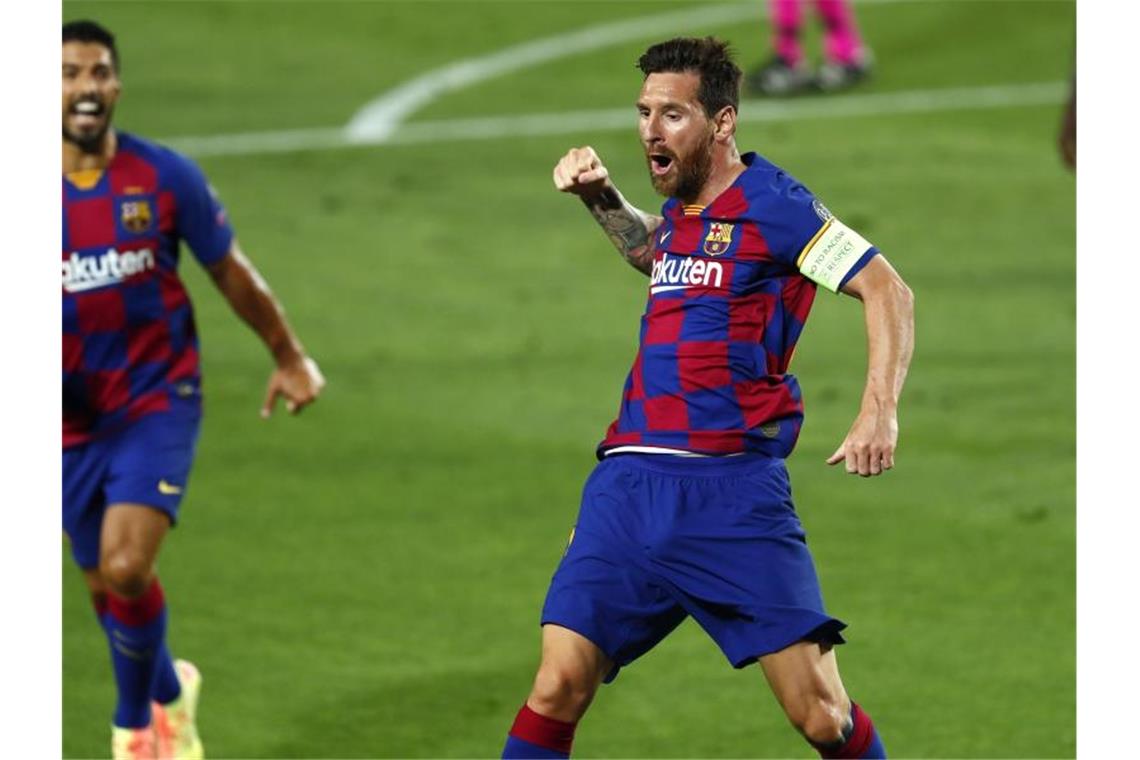 Barcelona und Messi erreichen Viertelfinale gegen Bayern Barcelonas Lionel Messi bejubelt sein Tor zum 2:0. Foto: Joan Monfort/AP/dpa