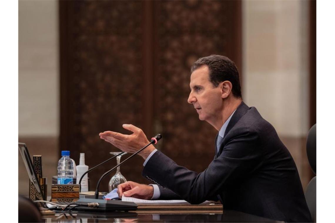Baschar al-Assad, Präsident von Syrien, während einer Kabinettssitzung. Foto: -/SANA/dpa