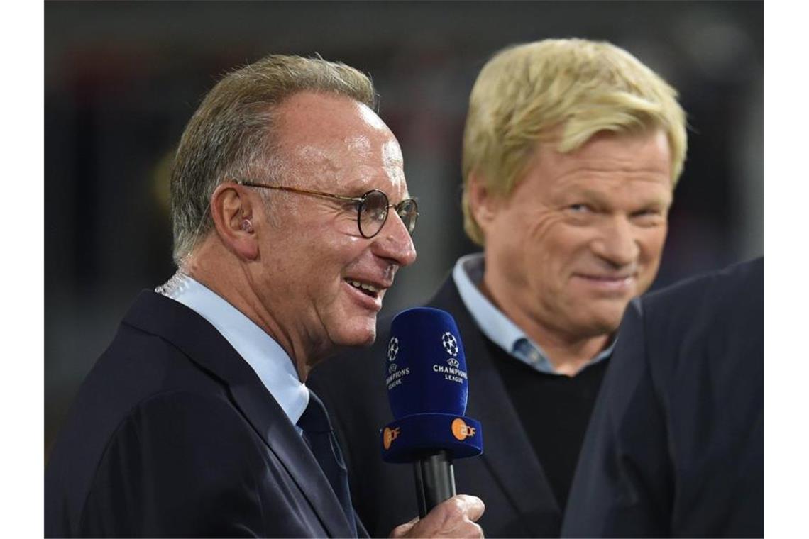 Bayern-Boss Karl-Heinz Rummenigge (l) und sein designierter Nachfolger Oliver Kahn. Foto: Andreas Gebert