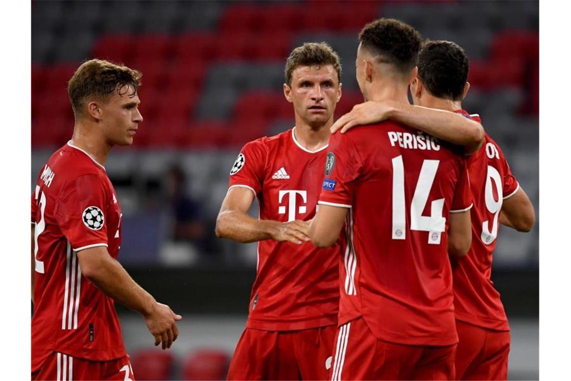 Bayerns Ivan Perisic (2.v.r.) jubelt nach seinem Treffer zum 2:0 mit den Mannschaftskameraden Müller (2.v.l.), Lewandowski (r) und Kimmich (l). Foto: Sven Hoppe/dpa