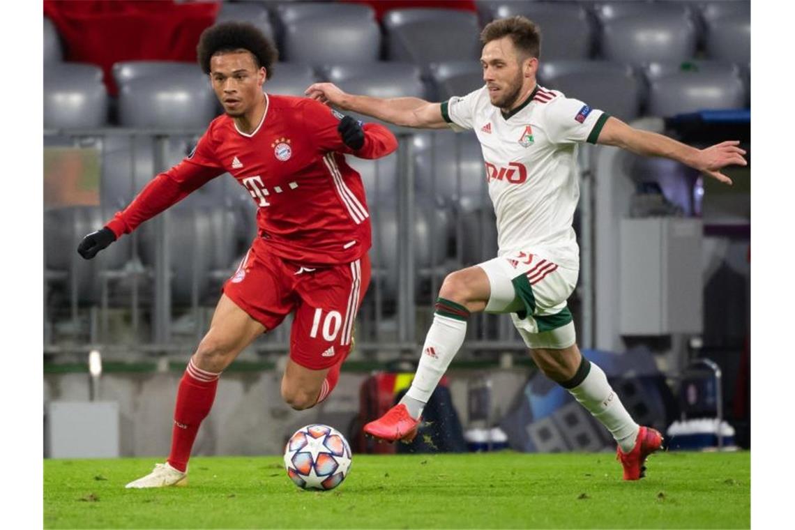 Süle und Choupo-Moting lassen Bayern gegen Moskau jubeln Bayerns Leroy Sane (l) im Dribbling gegen Moskaus Maciej Rybus. Foto: Sven Hoppe/dpa