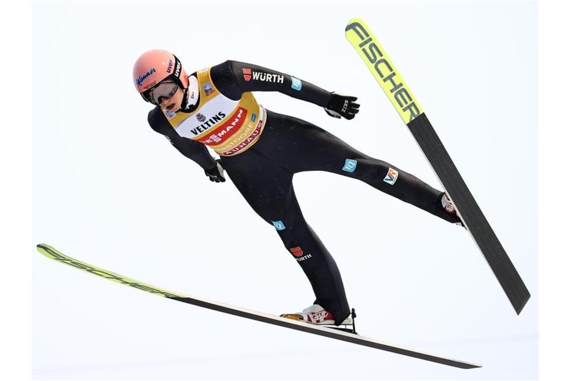 Beim Springen in Oberstdorf Fünfter: Karl Geiger. Foto: Daniel Karmann/dpa