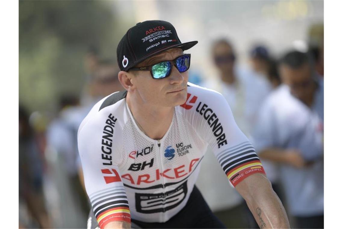 Schlamm, Alaphilippe und van Gaal: Die Highlights der Tour Beim Anstieg in La Planche des Belles Filles schob André Greipel sein Rad über die Ziellinie. Foto: Yorick Jansens/BELGA
