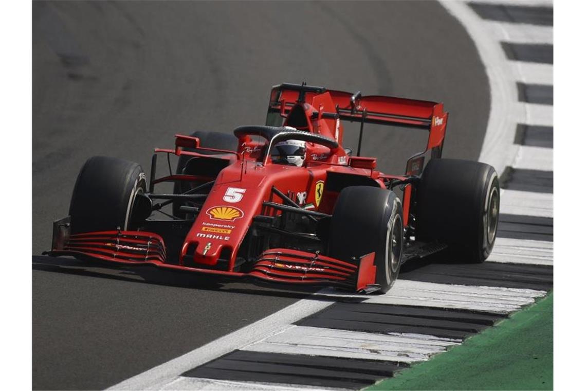 Bekommt in Barcelona ein neues Chassis: Ferrari-Pilot Sebastian Vettel. Foto: Bryn Lennon/Pool Getty/AP/dpa