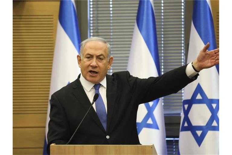 Benjamin Netanjahu, Premierminister von Israel, will trotz Korruptionsanklagen weiter machen. Foto: Oded Balilty/AP/dpa