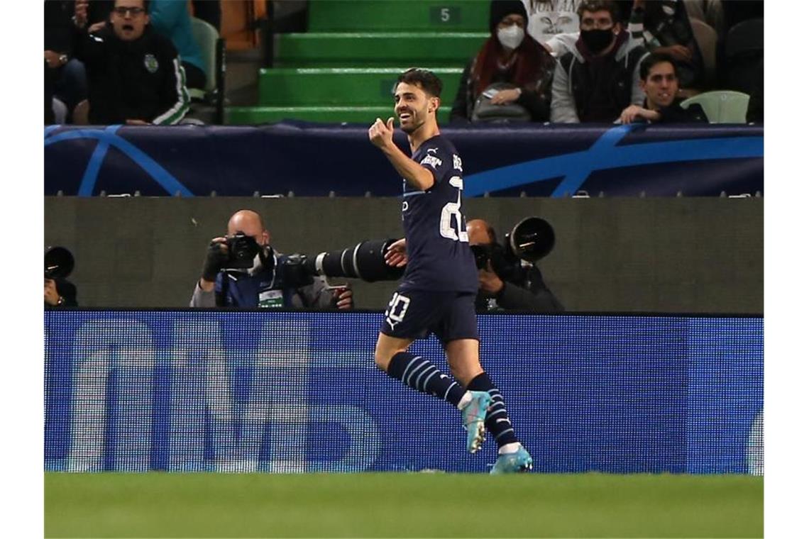 PSG dank Mbappé auf Kurs Viertelfinale - Kantersieg für City Bernardo Silva von Manchester City feiert seinen Treffer zum 4:0 in Lissabon. Foto: Isabel Infantes/PA Wire/dpa