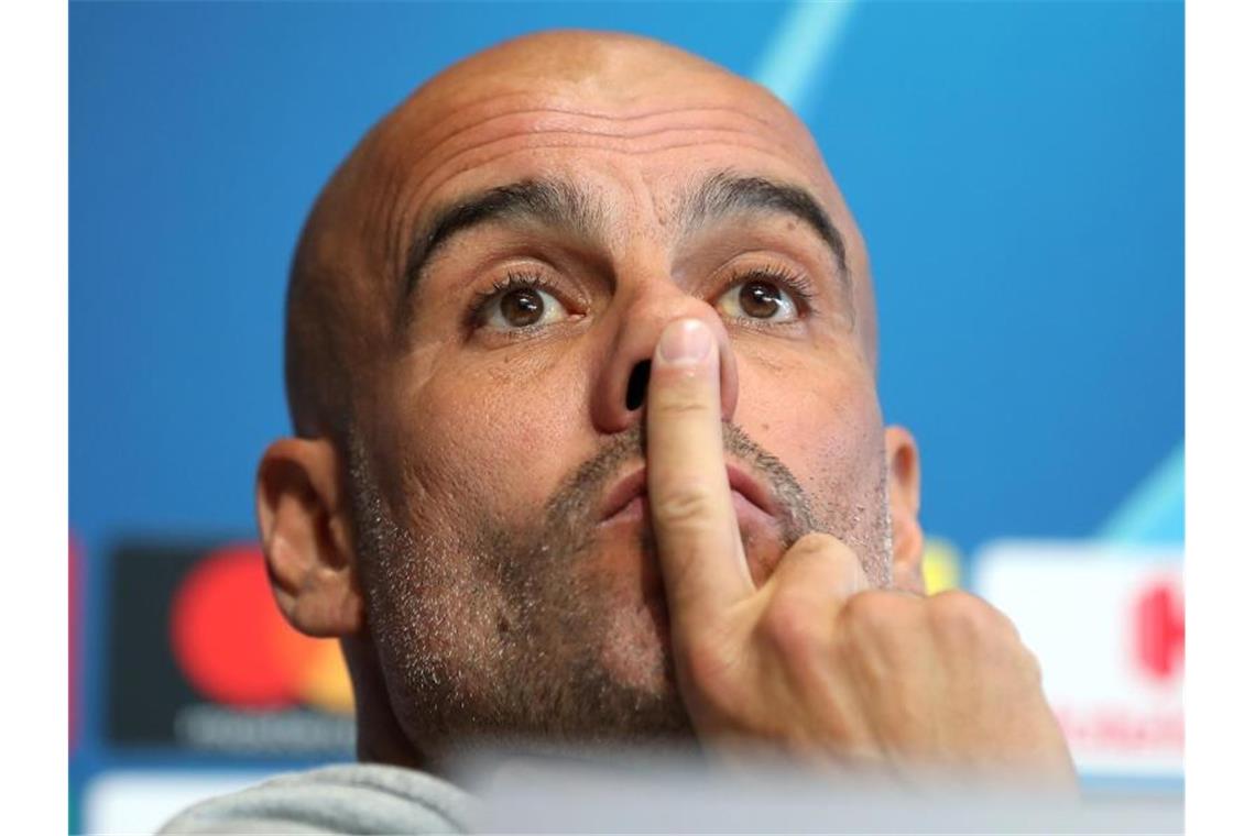 Besitzt bei Manchester City noch einen Vertrag bis 2021: Ex-Bayern-Trainer Pep Guardiola. Foto: Martin Rickett/PA Wire/dpa