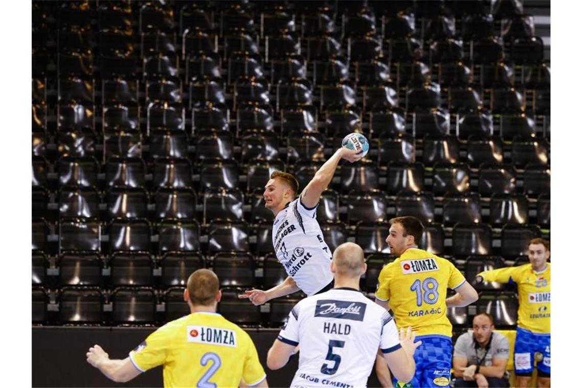 Flensburg gewinnt Champions-League-Auftakt Bester Felnsburger Werfer war Magnus Rød (M.) mit sechs Toren. Foto: Frank Molter/dpa