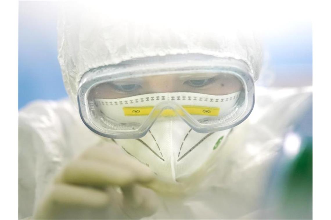 Zahl der Coronavirus-Infektionen in China steigt auf 68.500 Bisher konnte die Verbreitung des neuartigen Coronavirus nicht eingedämmt werden. Foto: Cheng Min/XinHua/dpa