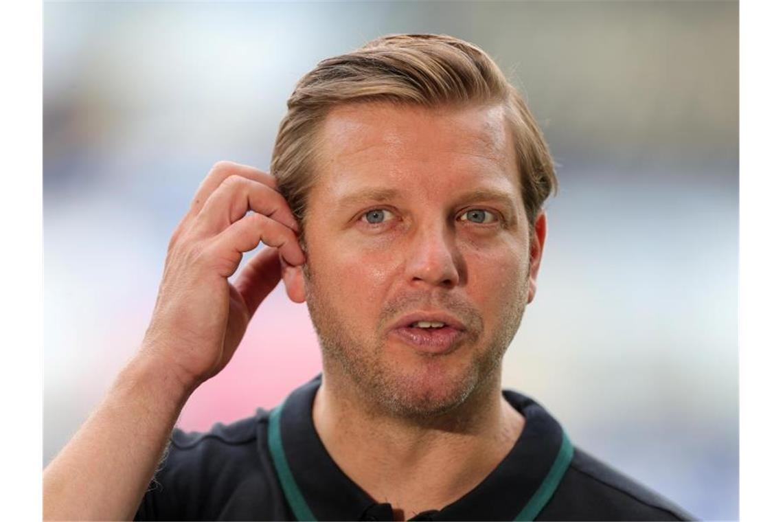 Bleibt Florian Kohfeldt Trainer des SV Werder Bremen. Foto: Friedemann Vogel/EPA/Pool/dpa