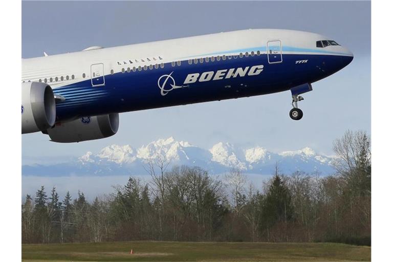 Boeing erhielt 2021 nach eigenen Angaben mehr als doppelt so viele Flugzeugbestellungen wie in den beiden Vorjahren zusammen. Foto: Ted S. Warren/AP/dpa