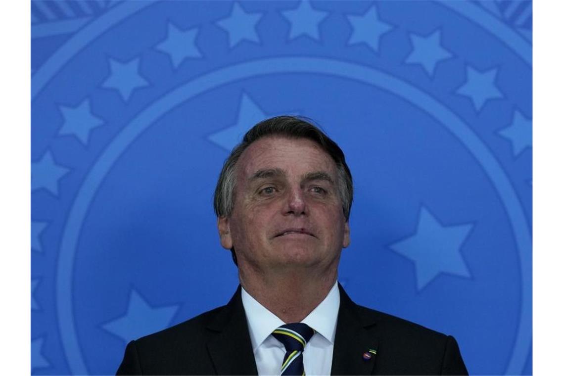 Bolsonaro: „Für absolut nichts verantwortlich“ Brasiliens Präsident Jair Bolsonaro ist sich sicher: „Wir haben vom ersten Moment an das Richtige getan.“. Foto: Eraldo Peres/AP/dpa