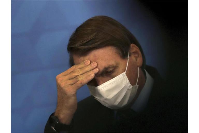 Brasiliens Präsident Jair Bolsonaro steht unter Druck. Foto: Eraldo Peres/AP/dpa