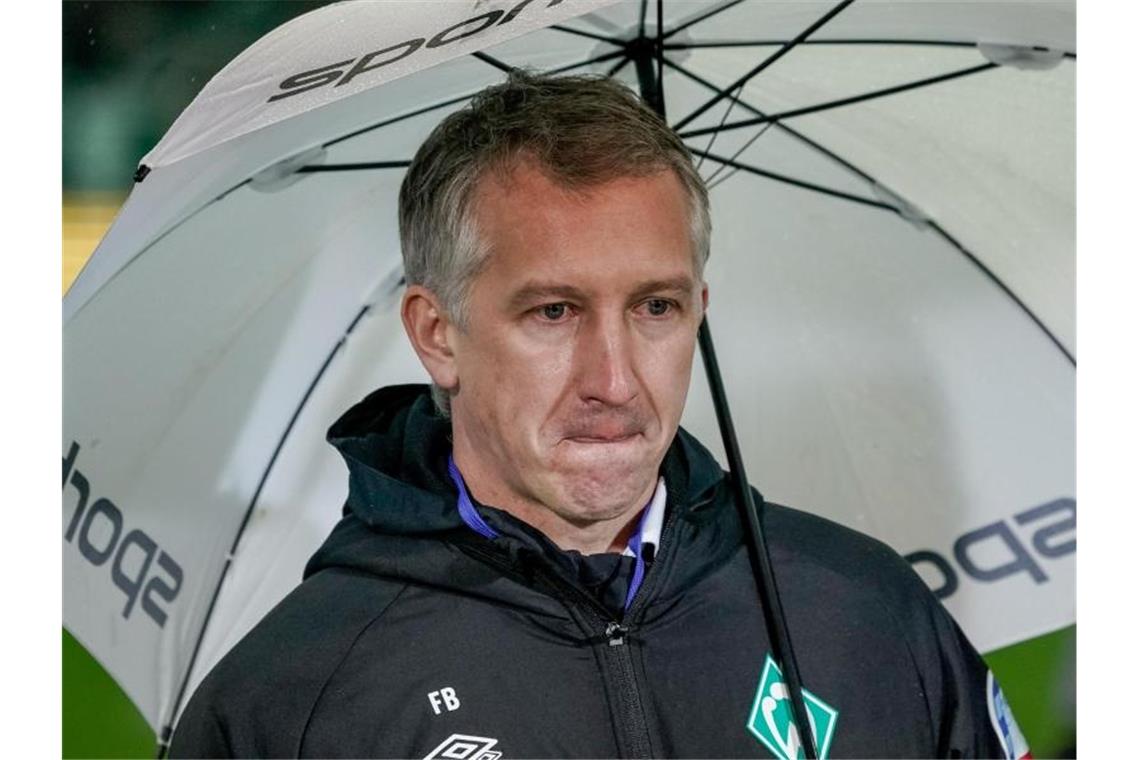 Zweitligisten starten nach Süden - Quartett sagt Trips ab Bremens Sportdirektor Frank Baumann sagte das Trainingslager kurzfristig ab. Foto: Axel Heimken/dpa/Archivbild