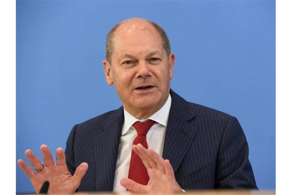 Bundesfinanzminister Olaf Scholz: „Riesenschub für unsere Zukunft“. Foto: Annegret Hilse/Reuters-Pool/dpa