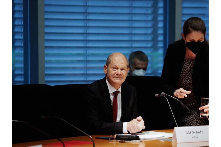 Bundesfinanzminister Olaf Scholz sitzt im Finanzausschuss des Bundestags. Foto: Carsten Koall/dpa
