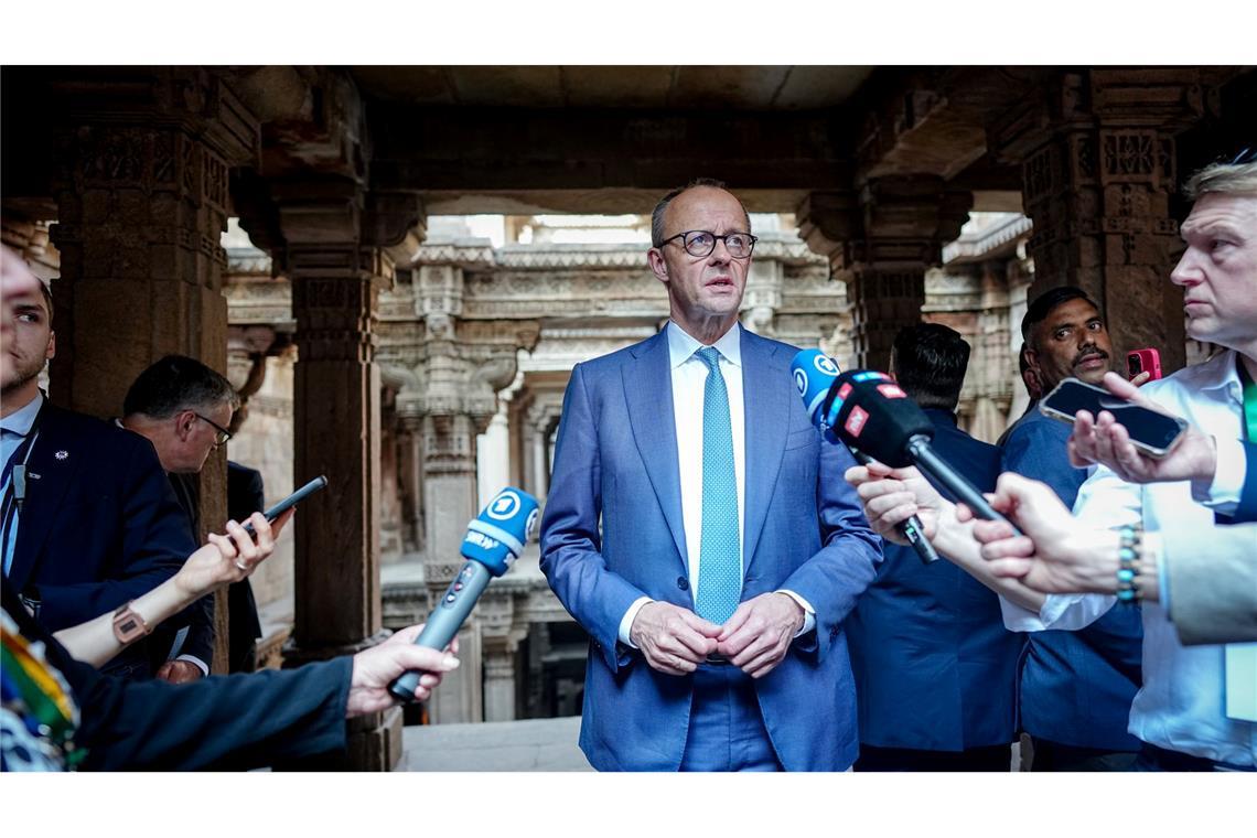 Bundeskanzler Friedrich Merz (CDU) äußert sich am Rande seines Indien-Besuchs auch zur Diskussion die Drohungen von US-Präsident Donald Trump gegen die offiziell zum Nato-Partner Dänemark gehörenden Arktis-Insel Grönland.