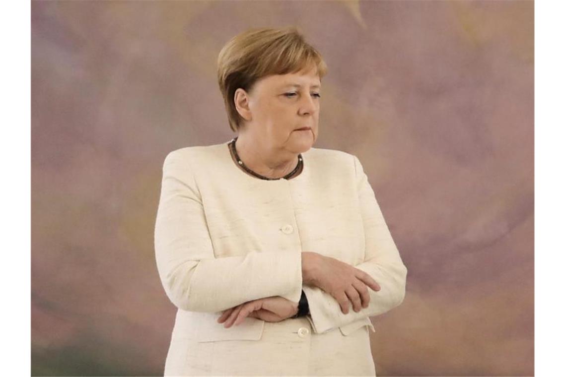 Merkel beteuert nach Zitteranfällen: Es geht mir gut Bundeskanzlerin Angela Merkel am Donnerstag bei einer Veranstaltung im Amtssitz des Bundespräsidenten, Schloss Bellevue. Foto: Kay Nietfeld