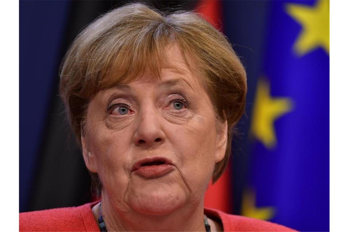 Bundeskanzlerin Angela Merkel bei einer Pressekonferenz nach der Einigung am frühen Morgen. Foto: John Thys/AFP Pool via AP/dpa