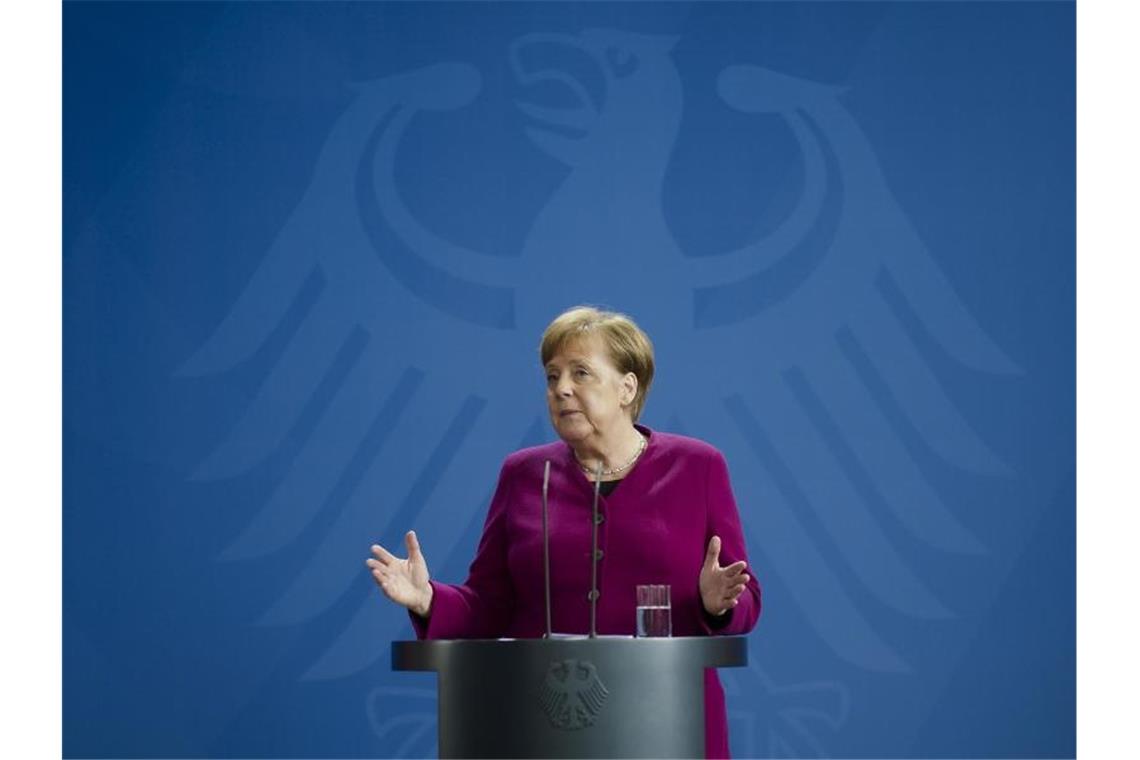Vorsichtig zurück in den Alltag: Experten empfehlen Zeitplan Bundeskanzlerin Angela Merkel berät mit den Länderregierungschefs zu der Krise. Foto: Markus Schreiber/AP POOL/dpa