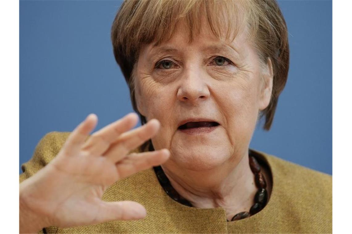Merkel verspricht Biden mehr Engagement - auch militärisch