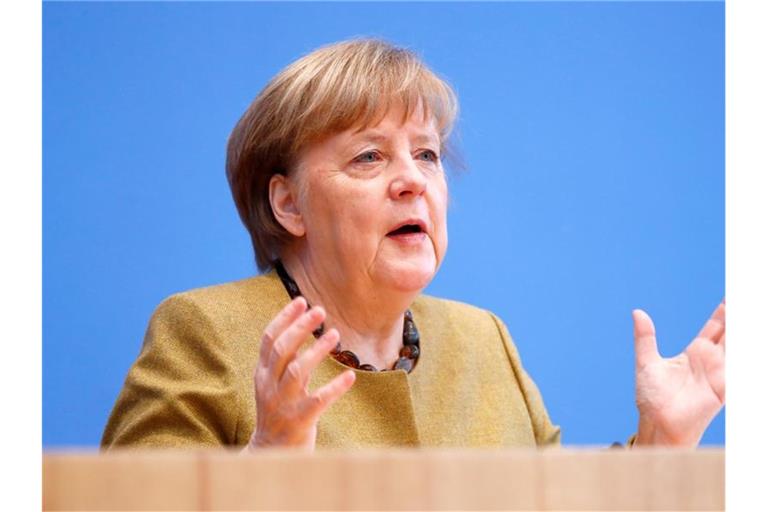 Bundeskanzlerin Angela Merkel (CDU) hat die Fortsetzung des Lockdowns in Deutschland verteidigt. Es ergebe sich derzeit ein sehr gespaltenes Bild, sagte sie am Donnerstag in Berlin. Foto: Fabrizio Bensch/Reuters/Pool/dpa