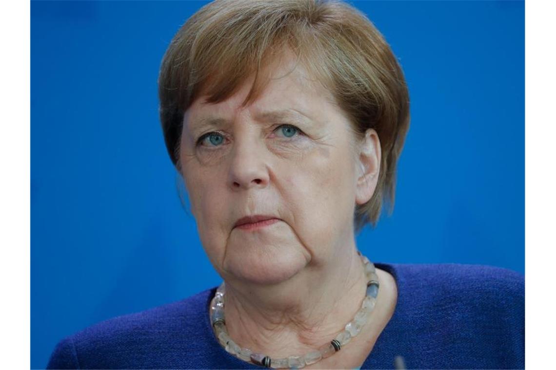 Bundeskanzlerin Angela Merkel hat die aktuellen Einschränkungen erneut verteidigt. Foto: Odd Andersen/AFP Pool/dpa