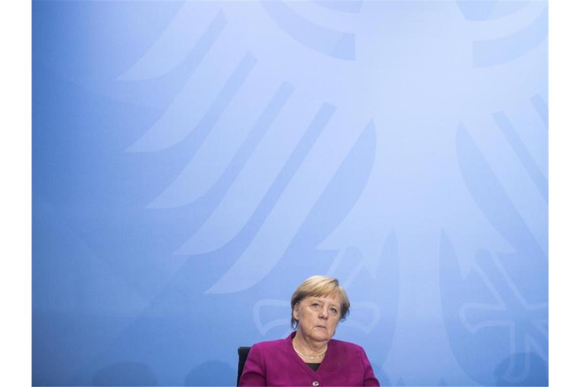 Neue Corona-Verschärfungen beschlossen Bundeskanzlerin Angela Merkel hat sich mit den Ländern auf einheitliche Regeln für Corona-Hotspots geeinigt. Foto: Stefanie Loos/AFP POOL/dpa