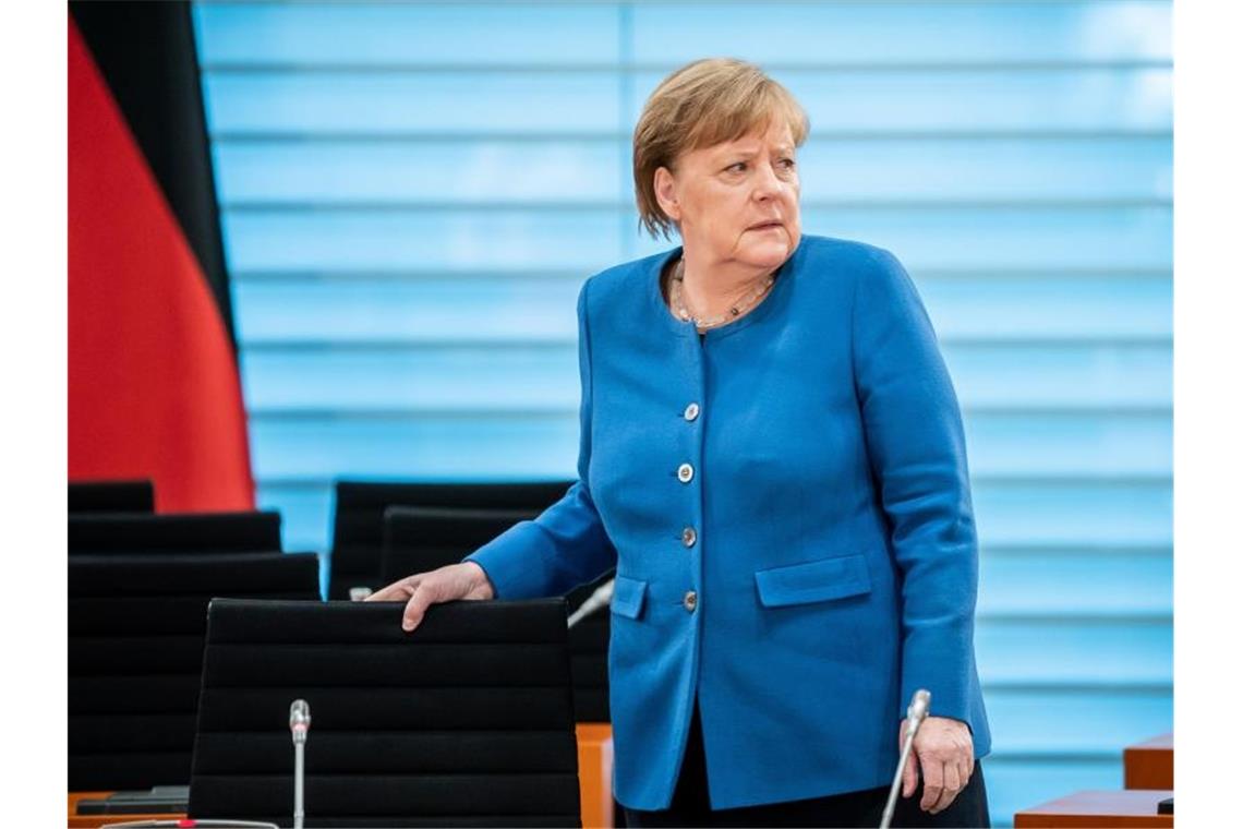 Bundeskanzlerin Angela Merkel richtet sich in einer Fernsehansprache direkt an die Bevölkerung. Foto: Michael Kappeler/dpa-pool/dpa