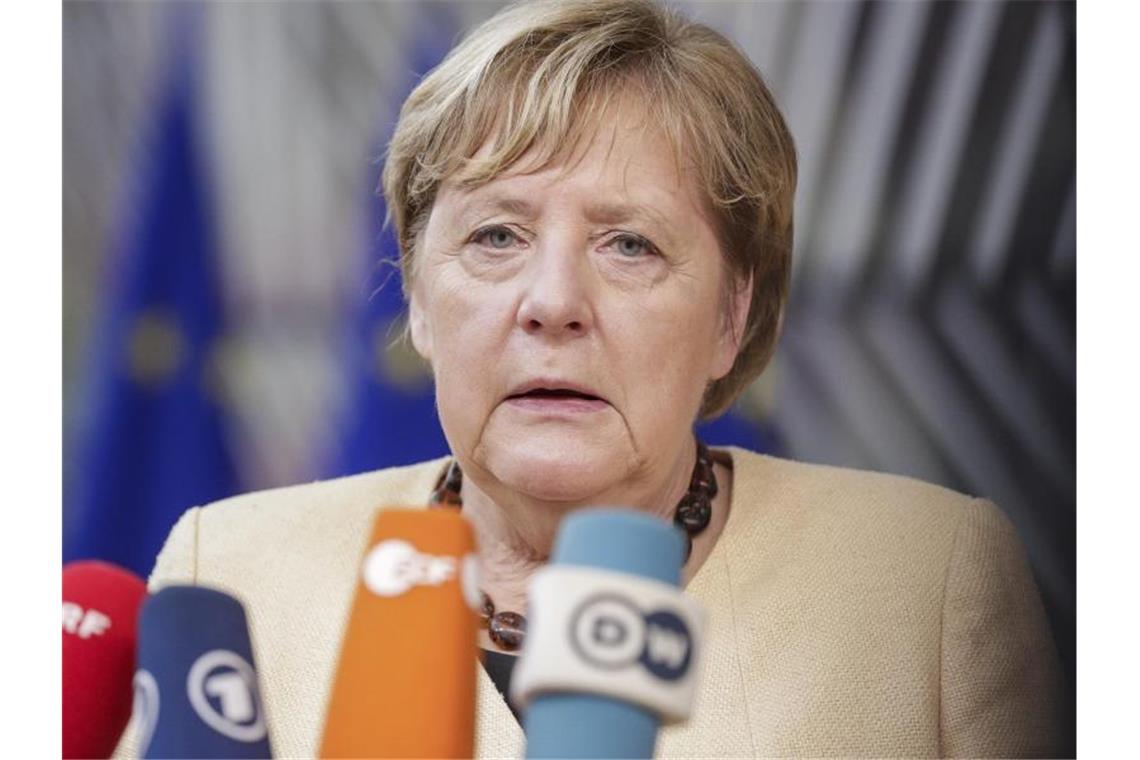 Merkel wirft Lukaschenko staatlichen Menschenhandel vor Bundeskanzlerin Angela Merkel steht in Brüssel Journalisten Rede und Antwort. Foto: Olivier Hoslet/EPA/AP/dpa