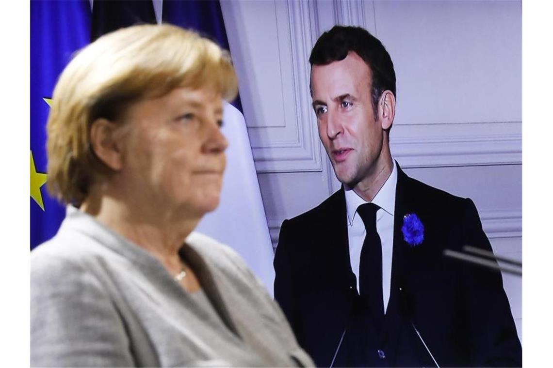 Merkel und Macron sehen Chinas Klimaziele positiv Bundeskanzlerin Angela Merkel während Videokonferenz mit Frankreichs Präsidenten Emmanuel Macron. Foto: Markus Schreiber/AP/dpa