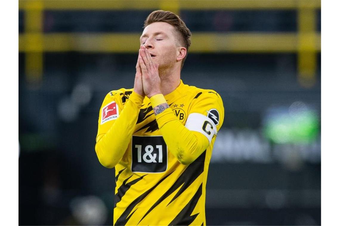 Konstant unkonstanter BVB - Reus bittet um Entschuldigung BVB-Star Marco Reus nahm die Schuld für das Remis gegen den FSV Mainz 05 auf sich. Foto: Guido Kirchner/dpa-Pool/dpa
