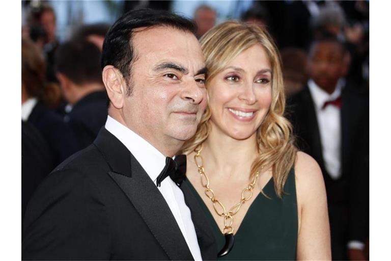 Carlos Ghosn, ehemaliger Vorstandsvorsitzender von Renault-Nissan-Mitsubishi, und seine Frau Carole. Foto: Ian Langsdon/EPA/dpa
