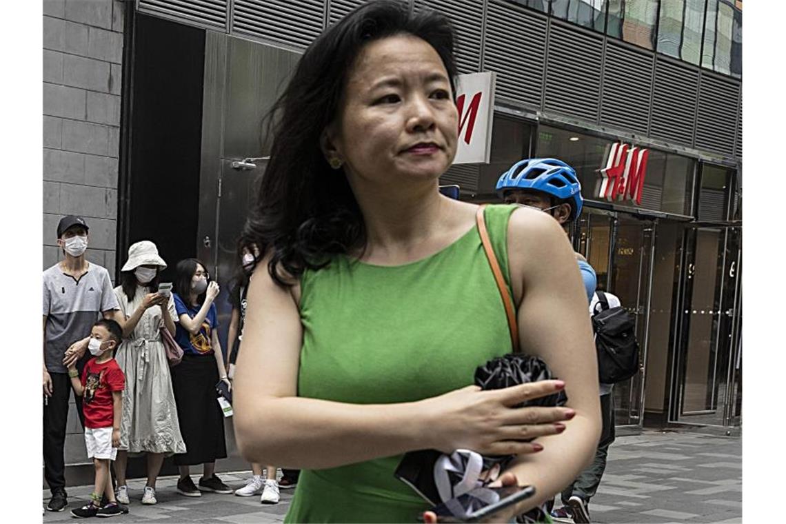 Australische Journalistin in China formell in Haft genommen Cheng Lei wird vorgeworfen, unerlaubt chinesische Staatsgeheimnisse ans Ausland weitergegeben zu haben. Foto: Ng Han Guan/AP/dpa